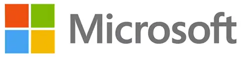 Logotipo da Microsoft exibindo um símbolo composto por quatro quadrados coloridos — laranja, verde, azul e amarelo — dispostos em grade à esquerda do nome 'Microsoft'. O nome da marca está escrito em uma fonte sem serifa na cor cinza sobre um fundo branco.